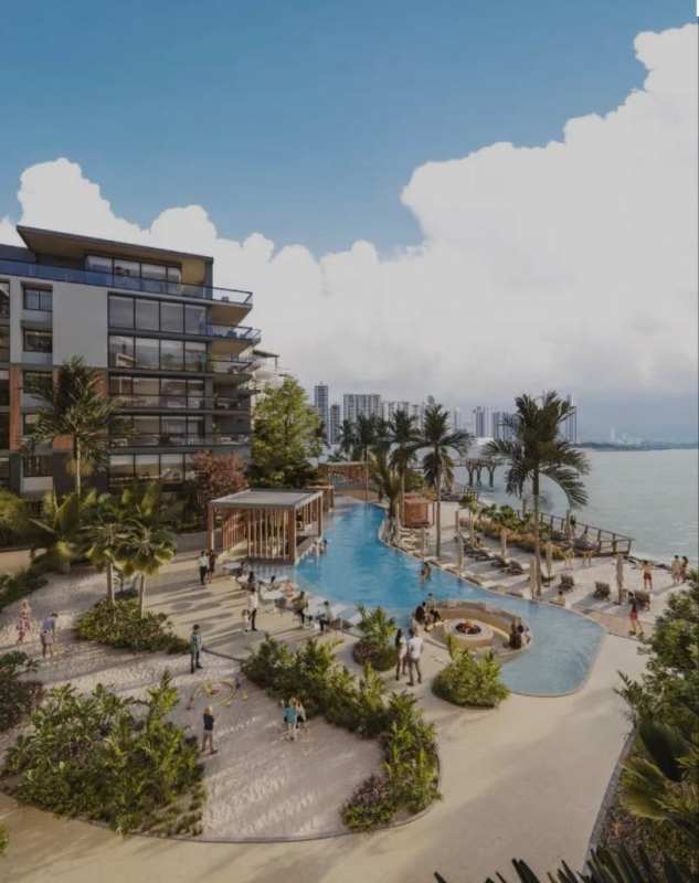 Large waterfront infinity pool with view of private yachts and city skyline at The Palms Ocean Reef Islands Panama