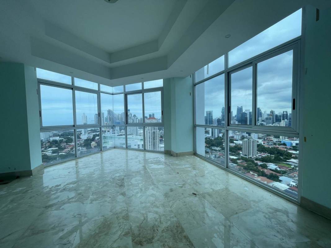 Modern high-rise glass facade tower with balconies PH Keops San Francisco Panama