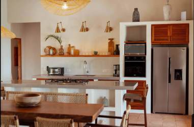 Bathroom with large double sink, wood accents and natural light Casa Serena Los Destiladeros Panama