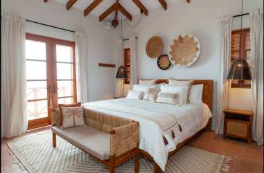 Bedroom with woven decor, French doors, vaulted ceiling Casa Serena Los Destiladeros Panama