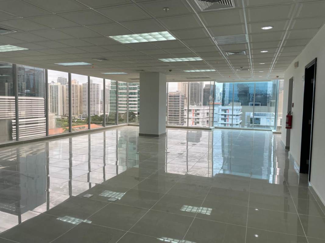 Open-plan office area with ceramic tile floors and ceiling lighting PH Office One Obarrio Panama