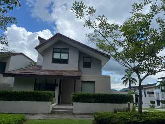 Exterior facade two-story house with garden and driveway PH Nativa Panama Pacifico