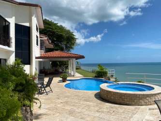 Outdoor oceanfront terrace with jacuzzi and pool Costa Esmeralda villa Panama