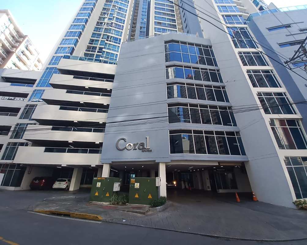 Modern high-rise condo PH Coral Towers with glass façade and parking garage Carrasquilla Panama