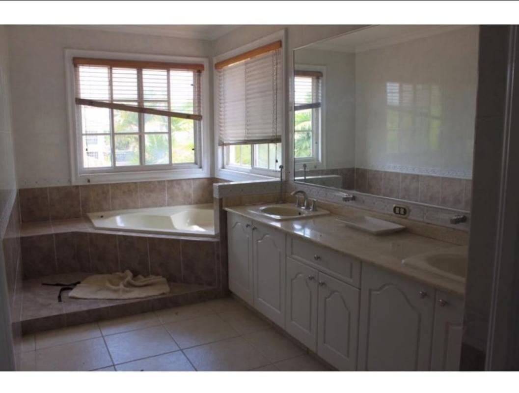 Bright living room with tile floors tray ceiling split AC unit Costa Azul Costa del Este Panama