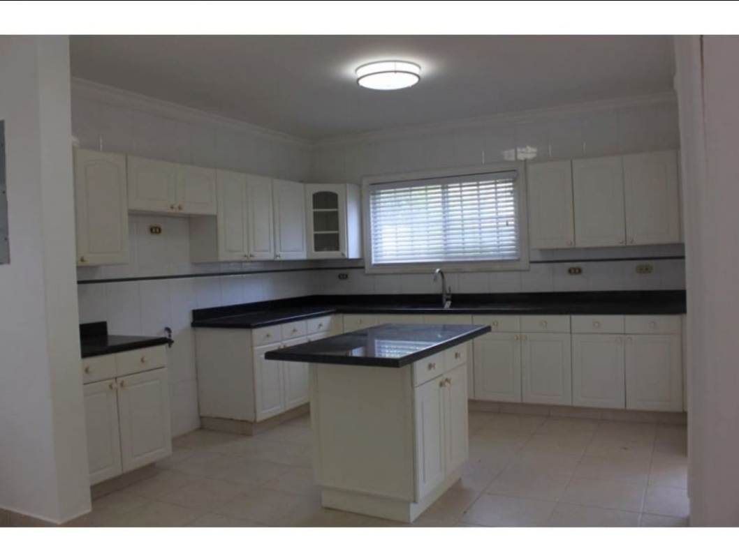 Mediterranean style covered patio with arches ceiling fans garden and pool Costa Azul Panama