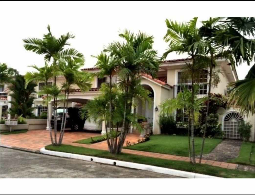 Front view Mediterranean luxury house tile roof landscaped yard Costa Azul Panama