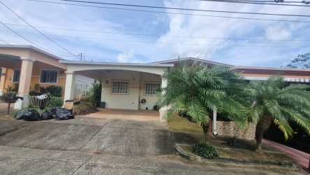 Private backyard garden with palm trees and covered terrace Costa Verde Panama