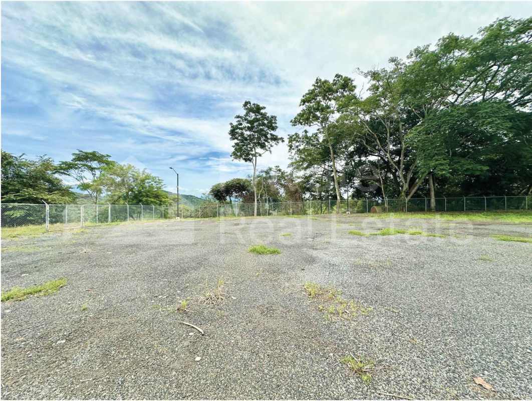 Gated commercial property entrance with security guard house Rancho Café Panama