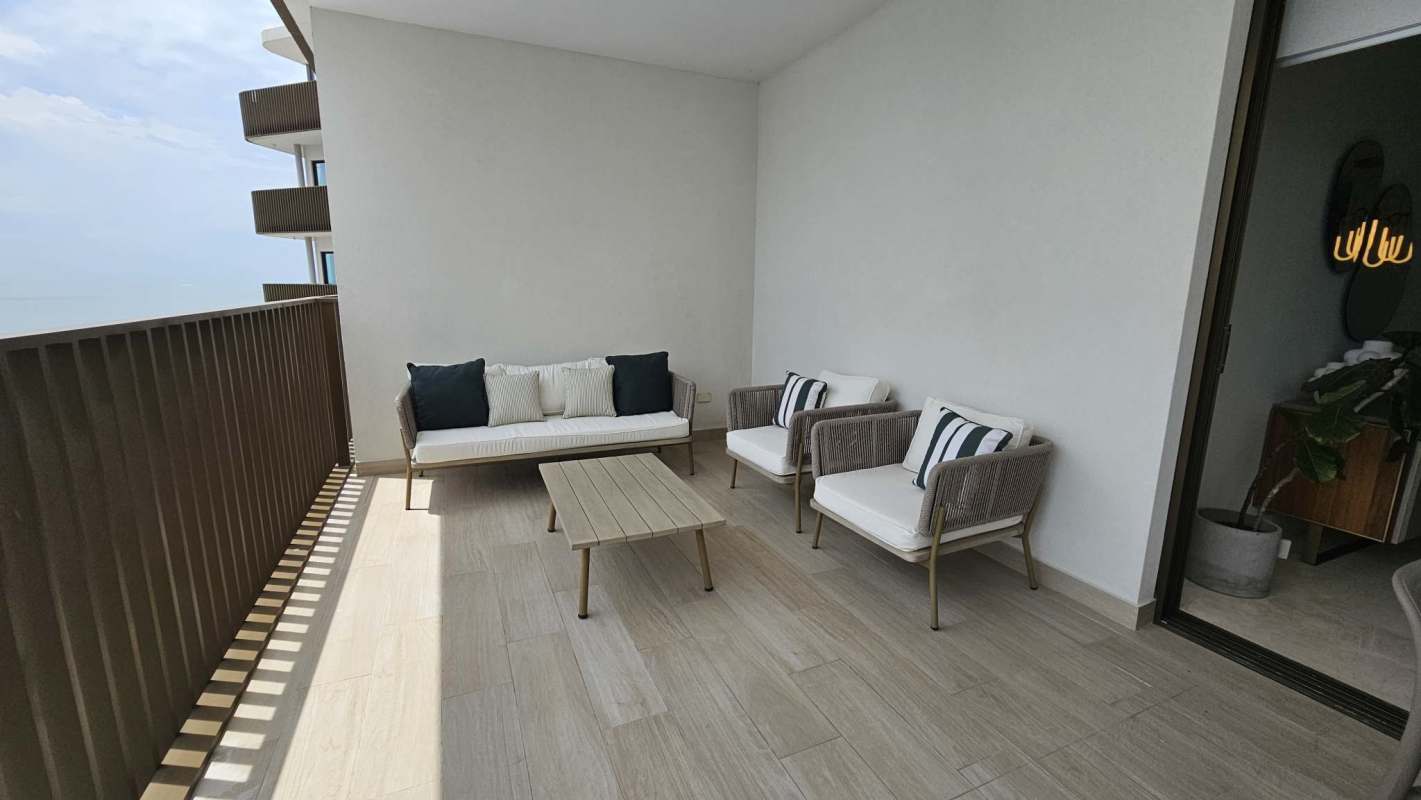 King-size master bedroom with ocean views and floor-to-ceiling glass Ocean Reef Islands