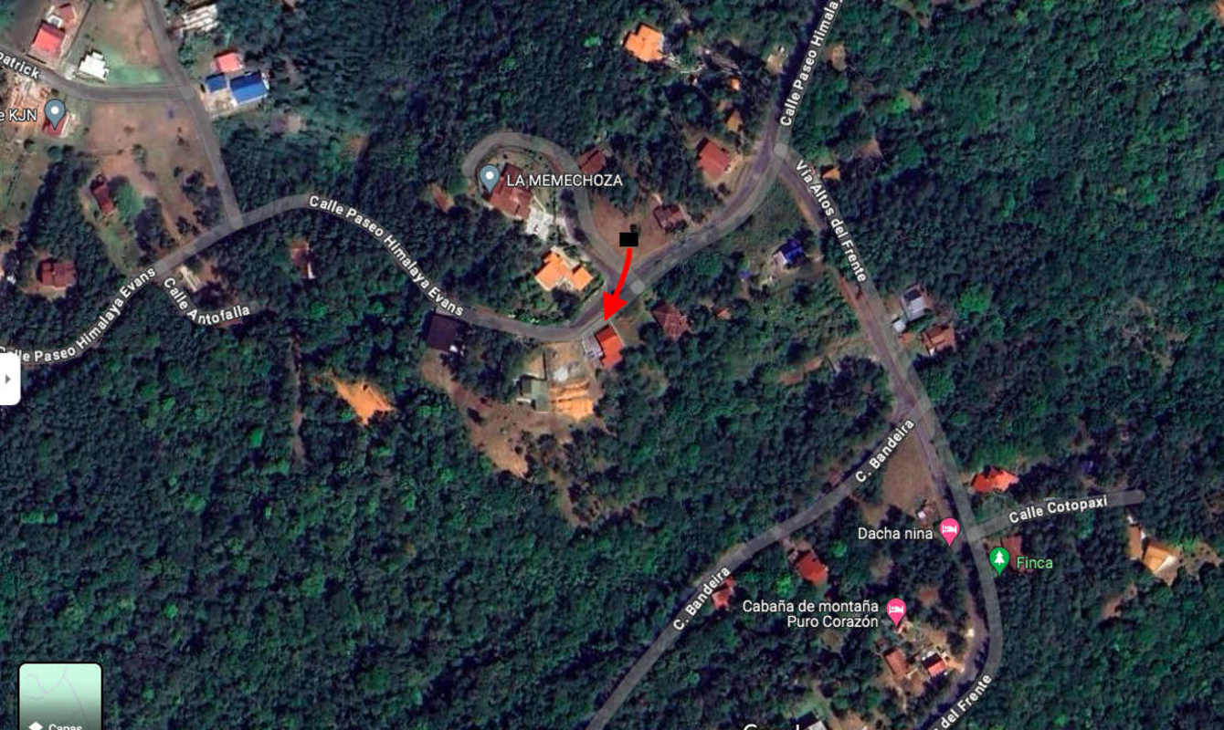 Aerial shot of mountain residential neighborhood surrounded by forests in Cerro Azul Panama