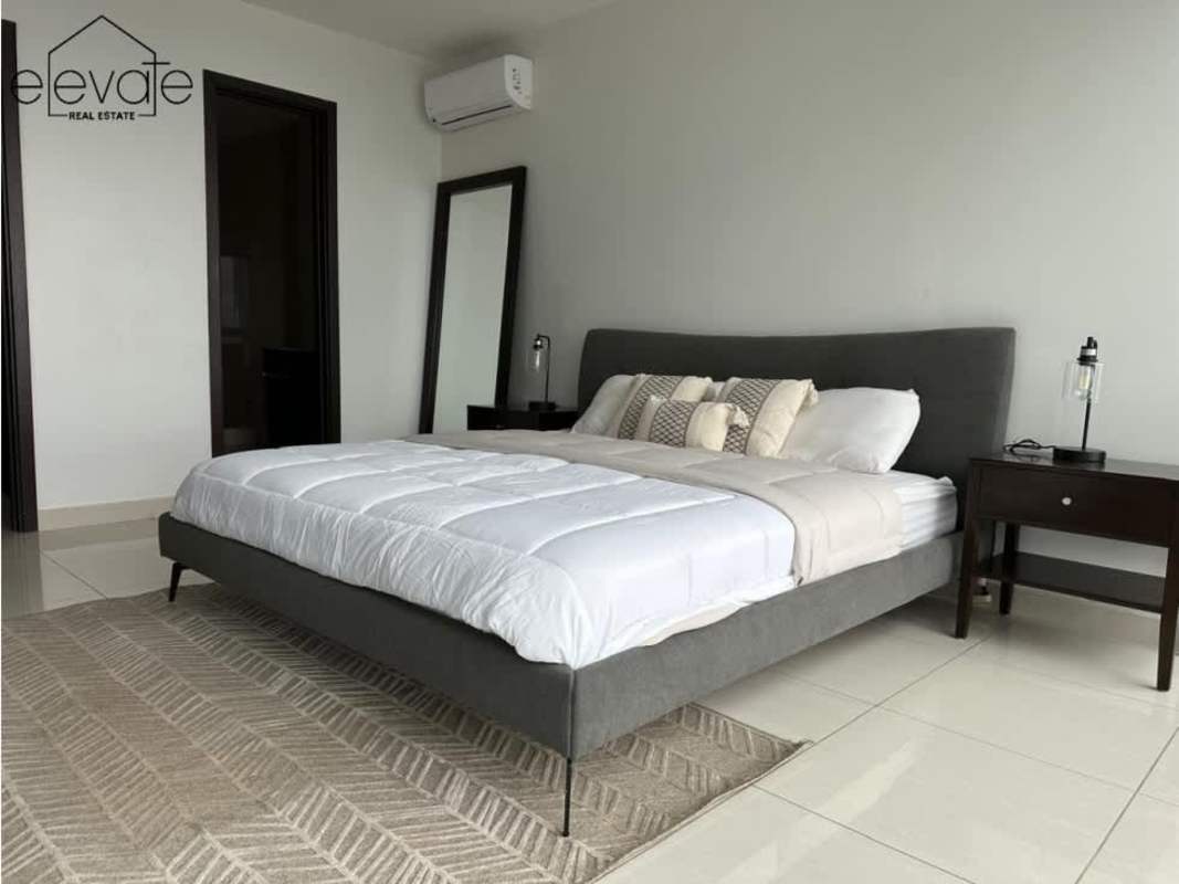 Modern minimalist bedroom with large windows and Pacific views in Allure Tower Panama City