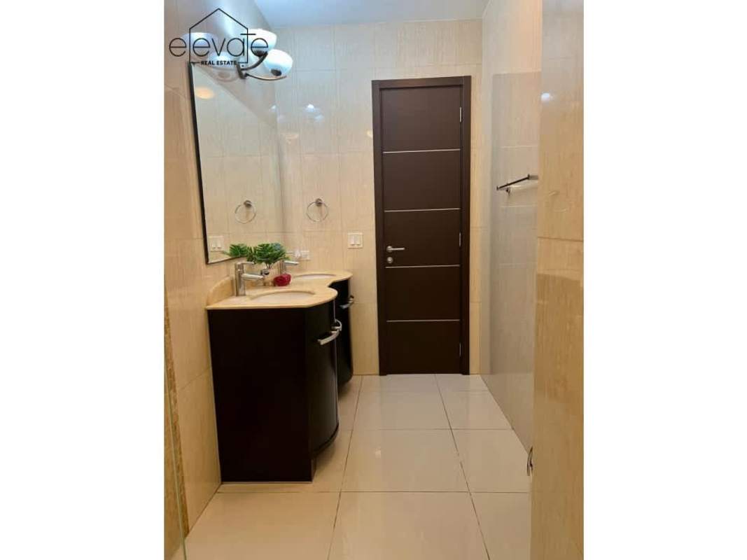 Infinity pool with ocean and city views at Allure Tower Bella Vista Panama