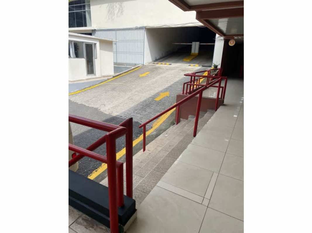 Side exterior view facing commercial units near Hotel El Panama in Panama City