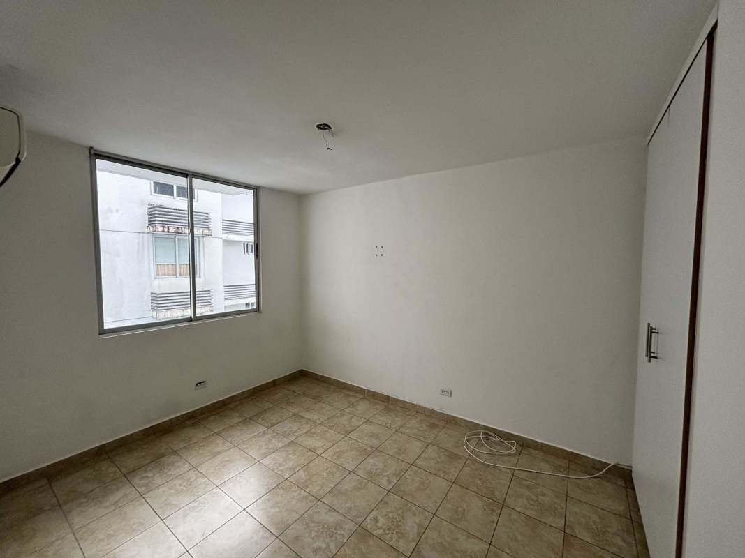 Bedroom with built-in closet and tile floor Cosmopolitan Tower Panama