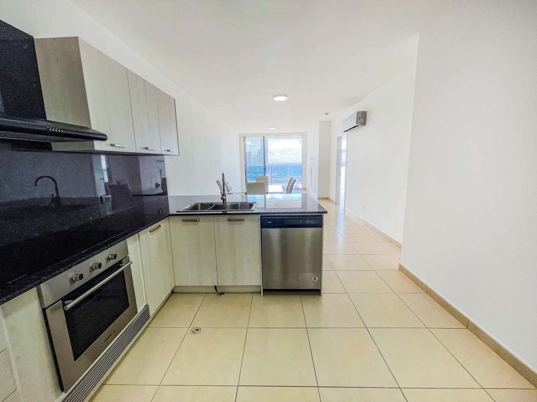 Remodeled kitchen with granite countertops and appliances in PH White Tower Avenida Balboa Panama
