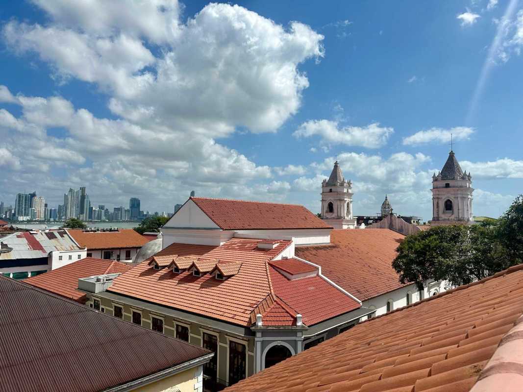 Aerial view colonial rooftops church towers skyline Casco Viejo Panama