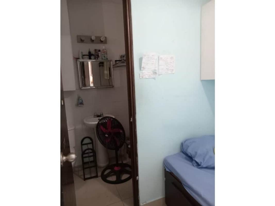 Modern kitchen with granite countertops, appliances, dark cabinetry in San Francisco Panama apartment for rent