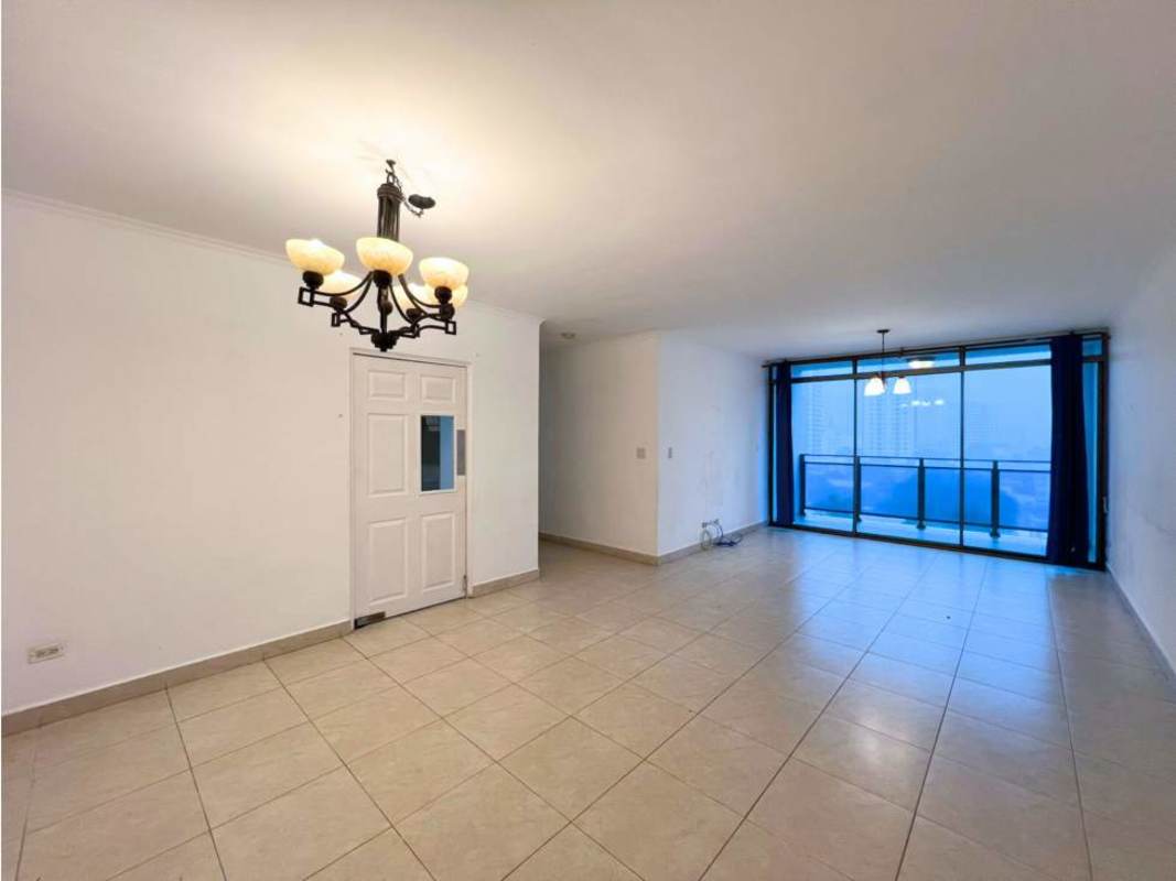 Spacious living room with tile floors glass sliding doors to balcony city skyline PH Blue Bay Tower Panama