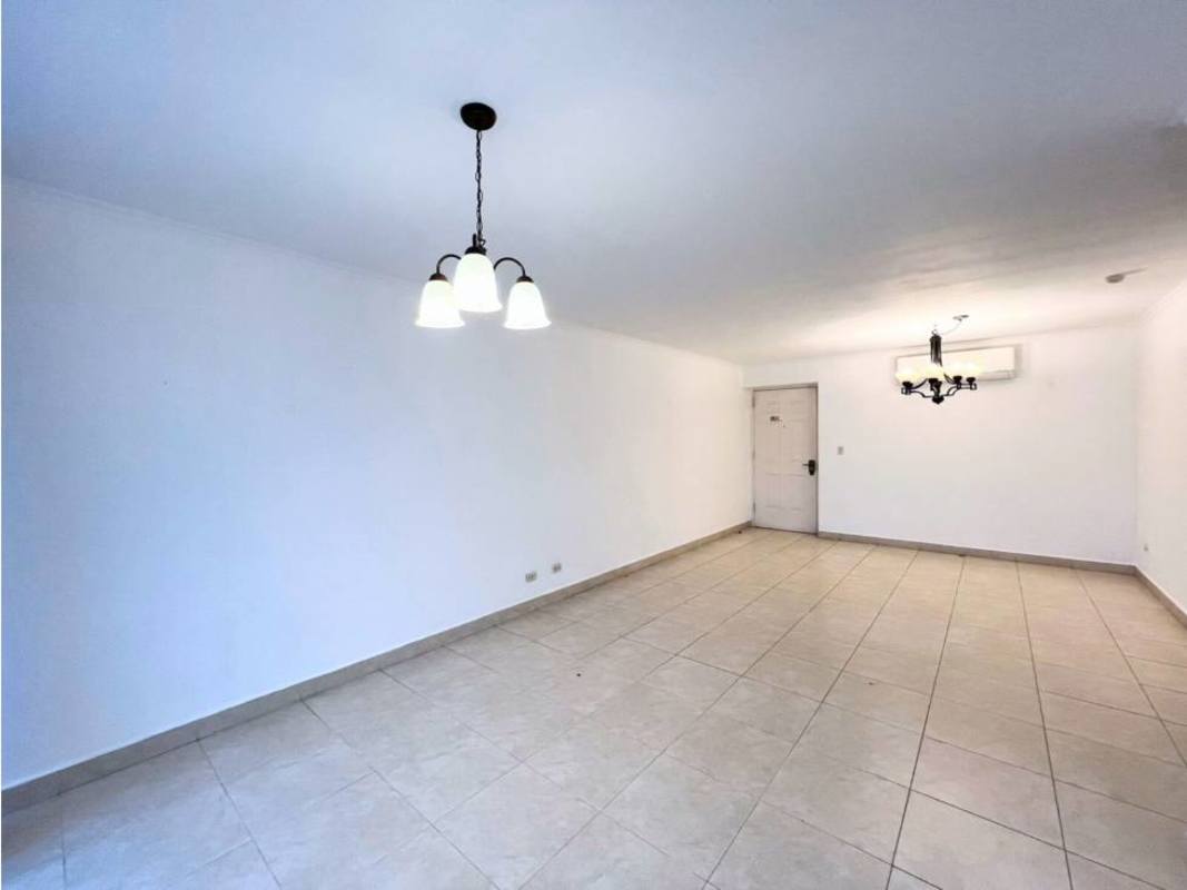 Open plan living dining space with ceramic tiles white walls and AC unit PH Blue Bay Panama