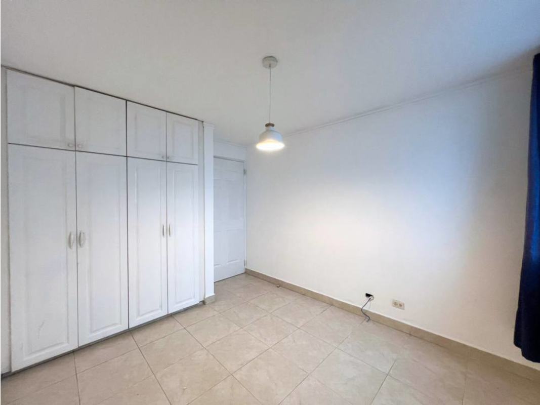 Bedroom with large window blue curtains AC built-in closet PH Blue Bay Panama