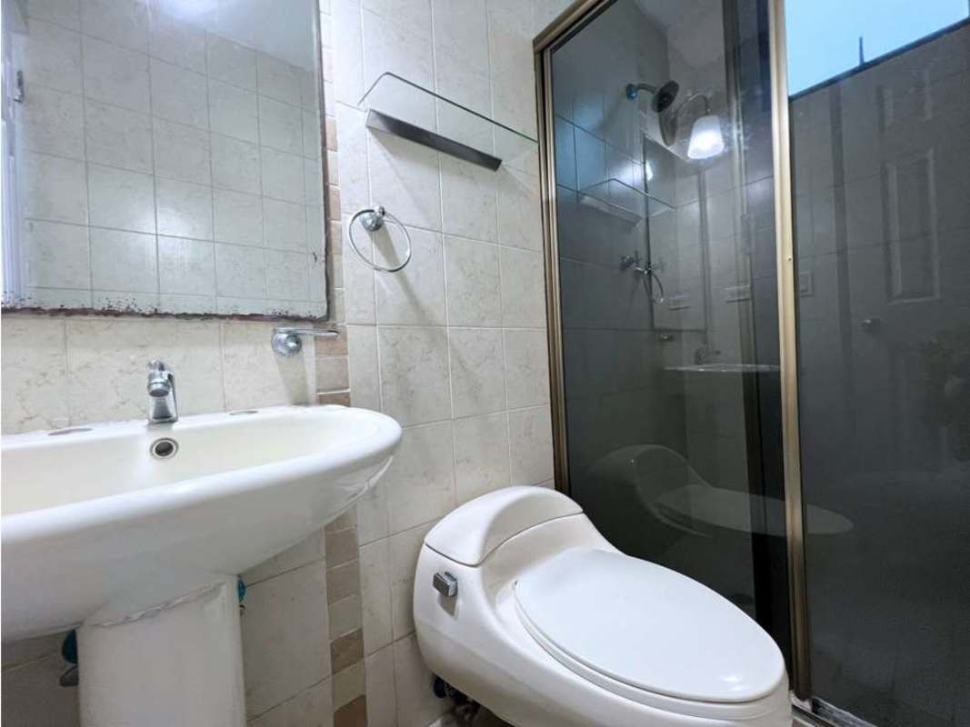 Contemporary bathroom with glass shower white tiles and pedestal sink PH Blue Bay Tower Panama