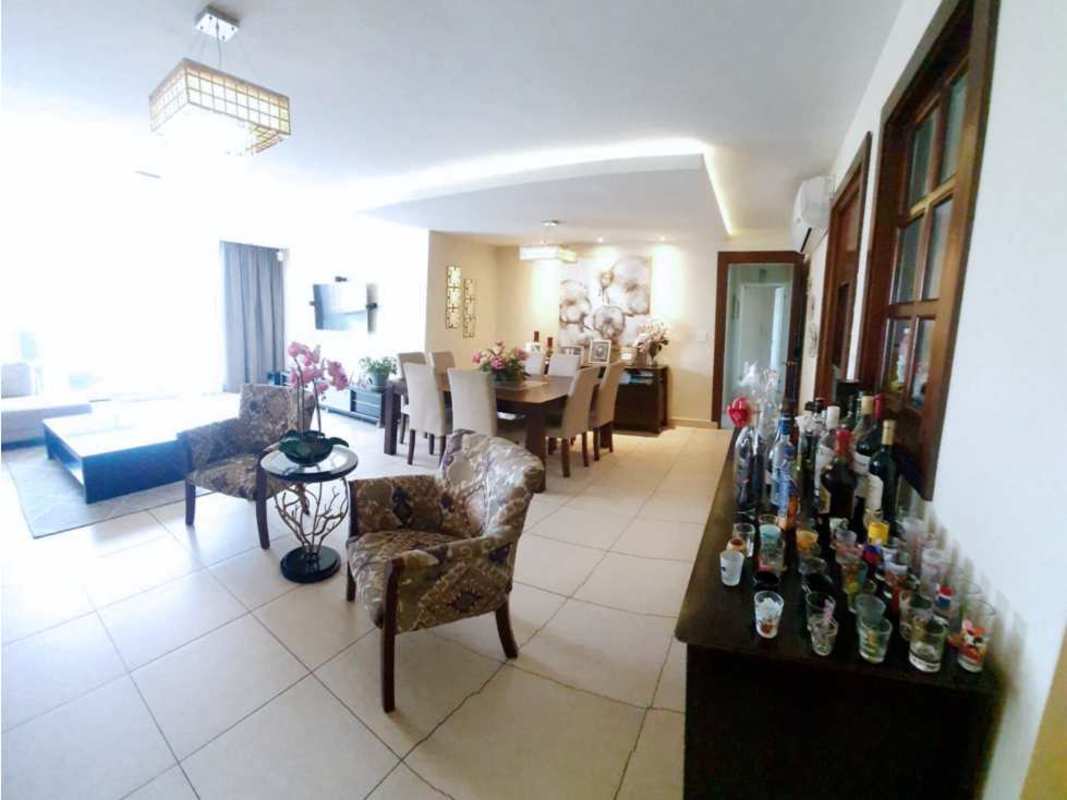 Cozy modern living area with sectional sofa, chandelier, city view PH Costa View Costa del Este Panama