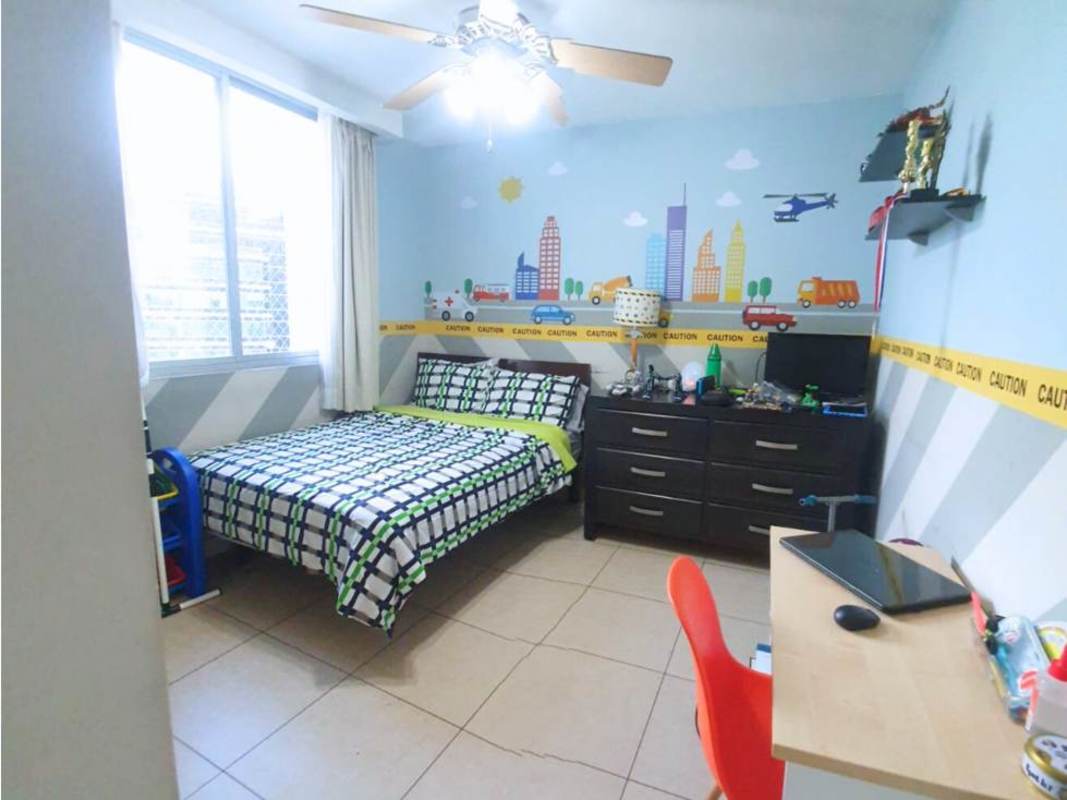 Colorful kids bedroom with city mural bed desk large windows PH Costa View Costa del Este Panama