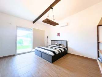 Guest bedroom with en suite bathroom split AC PH Malibu beach home Panama