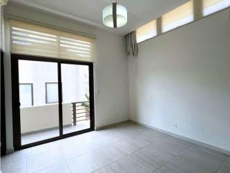 Spacious open kitchen with granite countertops and appliances in PH Nativa Panama Pacifico