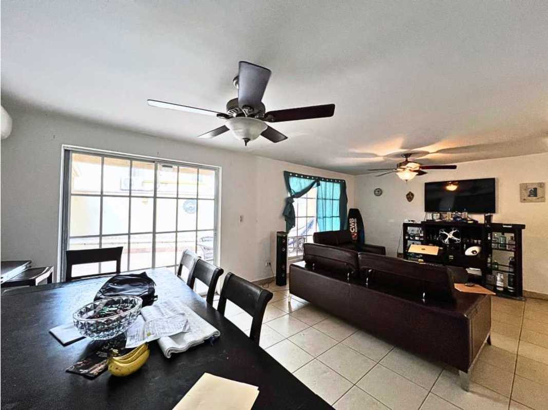Living room with big windows, brown sofas, ceiling fans PH Dorado Spring Panama
