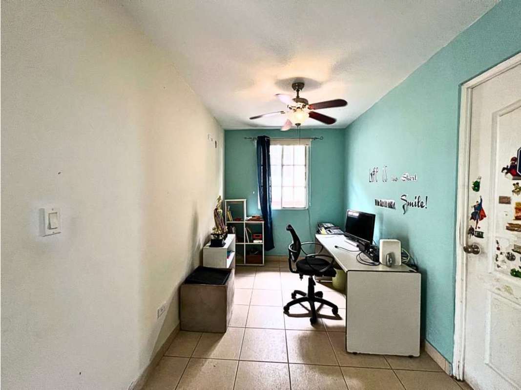 Bright home office with blue wall, ceiling fan, window and desk PH Dorado Spring Panama