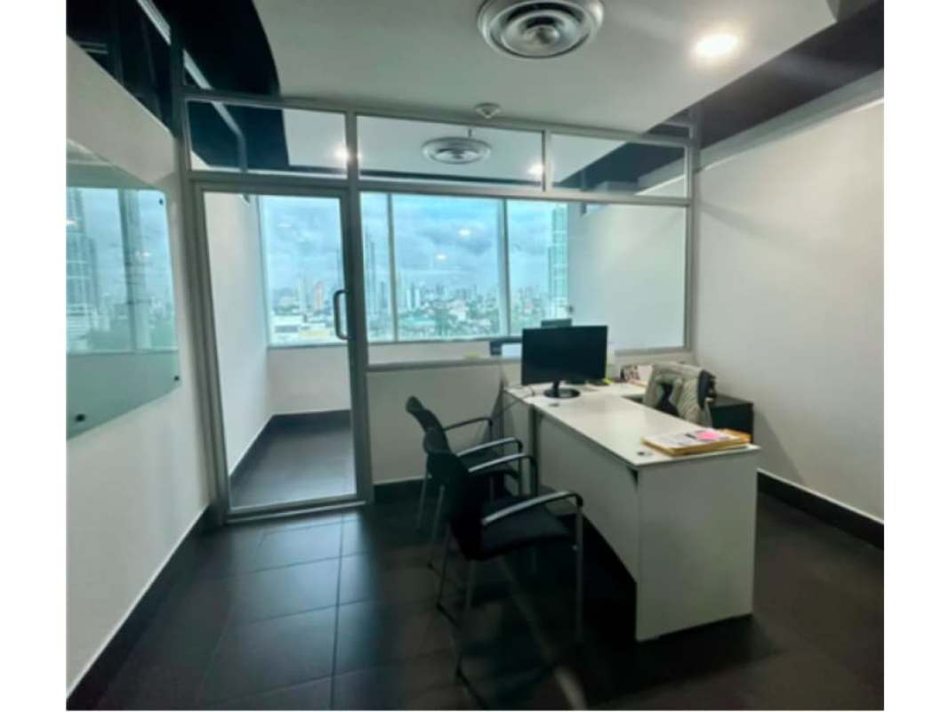 Executive office large window city view modern furnishings Punta Pacífica Panama