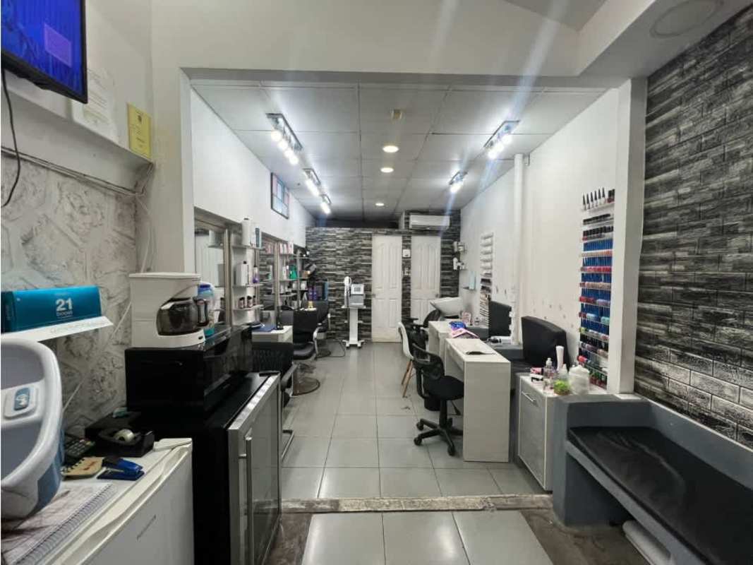 Reception desk entrance with glass door, nail polish display, in Via Porras Panama City