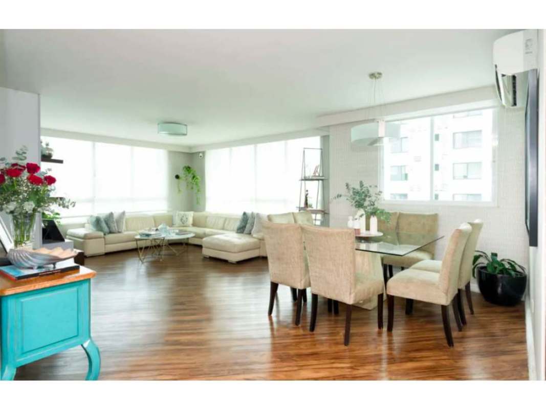 Large windows open plan living dining hardwood floors in PH Bahía Obarrio Panama City