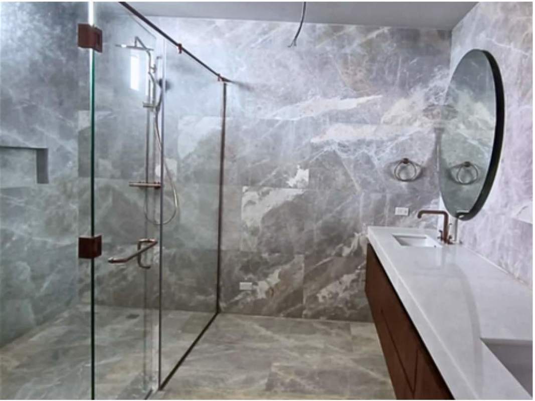 Modern bathroom marble tile rain shower glass enclosure PH The Towers