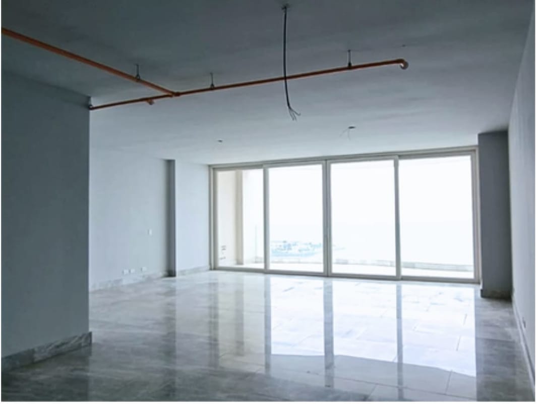 Bright open living area with marble floor, floor-to-ceiling windows PH The Towers Panama