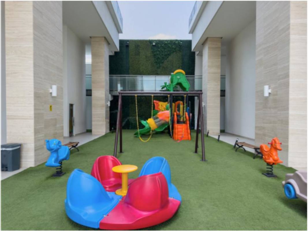 Indoor gym with large windows city skyline PH The Towers Panama