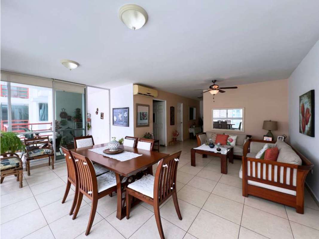 Kitchen with wood cabinets, granite countertops, gas range PH Sol del Este Costa del Este Panama City