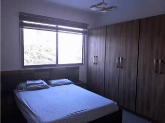 Bedroom with closet space and windows in Panama Pacifico PH Mosaic apartment for sale