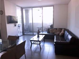 Expansive terrace with space for outdoor dining and views of gardens in PH Mosaic