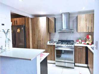 Modern bathroom with glass shower and sink in PH Mosaic Panama Pacifico apartment for sale