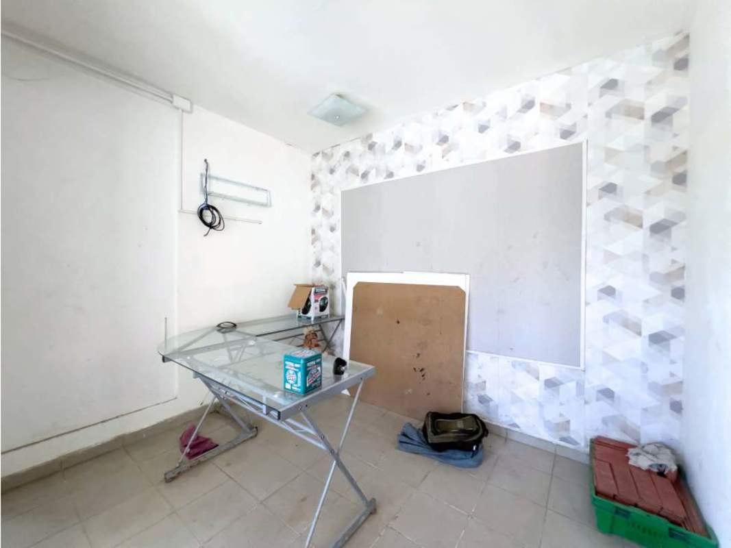 Minimalist workspace with glass-top desk in commercial rental unit Panama City