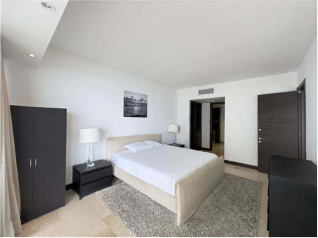 Furnished master bedroom with ocean views and ensuite bath at PH The Ocean Club Punta Pacifica