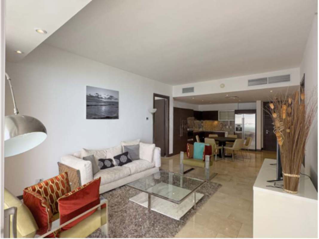 Modern kitchen with granite and dining area in PH The Ocean Club luxury condo Punta Pacifica Panama