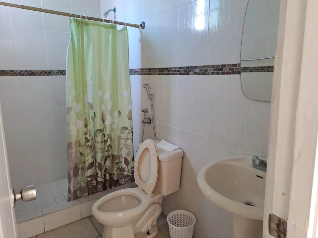 Open concept living dining with natural light and terrace access PH Lefevre Garden Panama