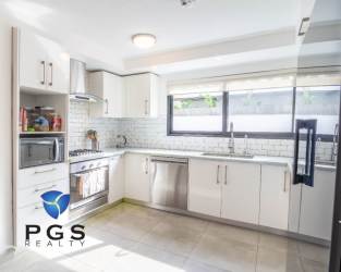 Open concept living and dining area with exposed beams and ocean views San Carlos Panama