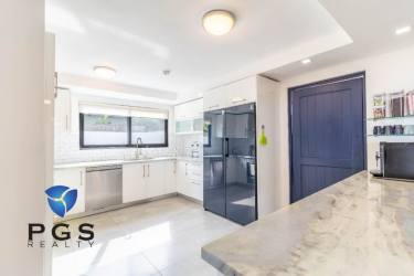 Modern marble bathroom with double vanity glass shower in Vistamar Resort Panama waterfront villa