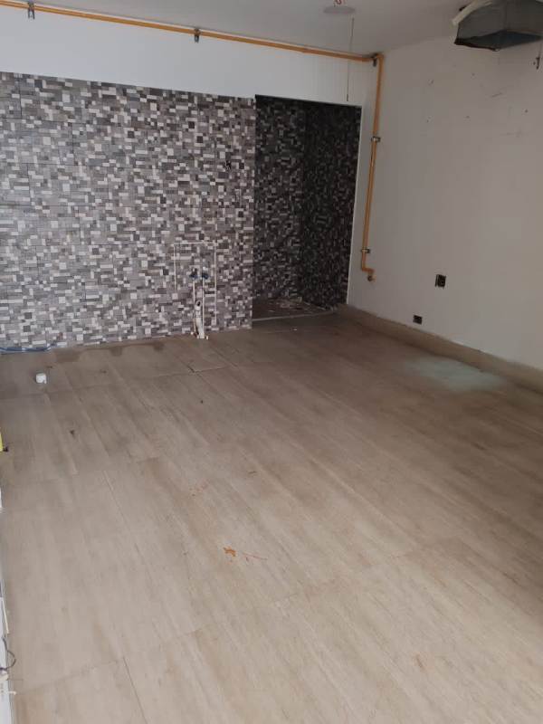 Kitchen or bar area under renovation in commercial lease space with backsplash tile at Plaza 68 Panama