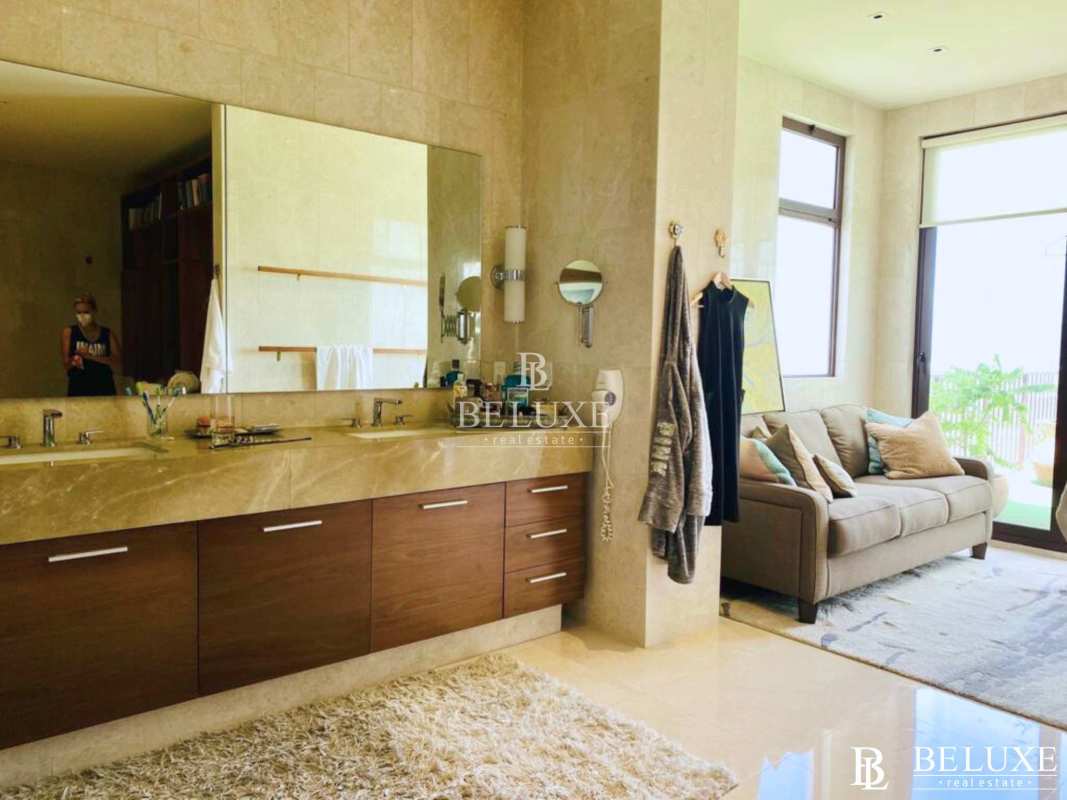 Spacious marble bathroom with double sink vanity and glass shower luxury penthouse Santa Maria Court Panama
